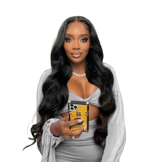 A woman Yandy Smith- Harris  displaying a U-Part Human Hair Wig in bodywave texture, showing the product's adaptability to different styles.
